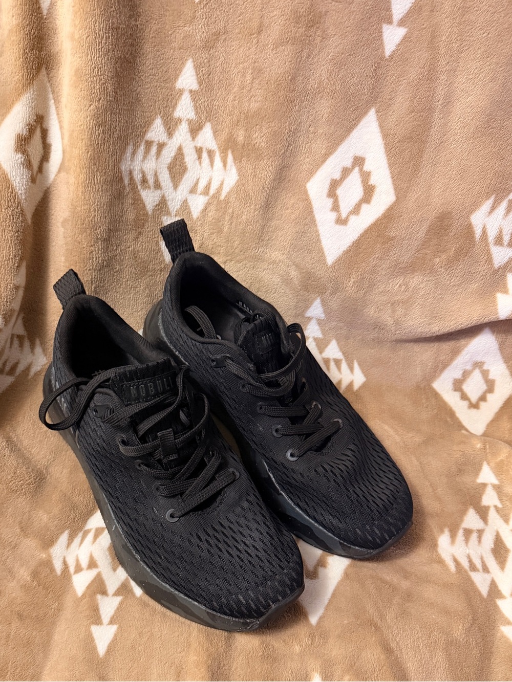 NOBULL training shoes featuring a breathable mesh upper